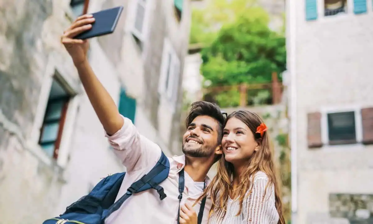 couple traveling selfie