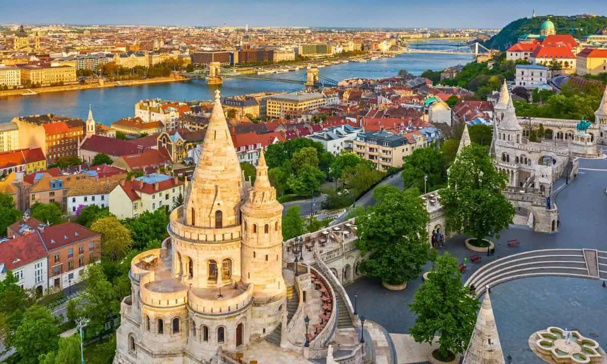 Fisherman's Bastion at sunset with Szechenyi Chain Bridge in Budapest, Hungary