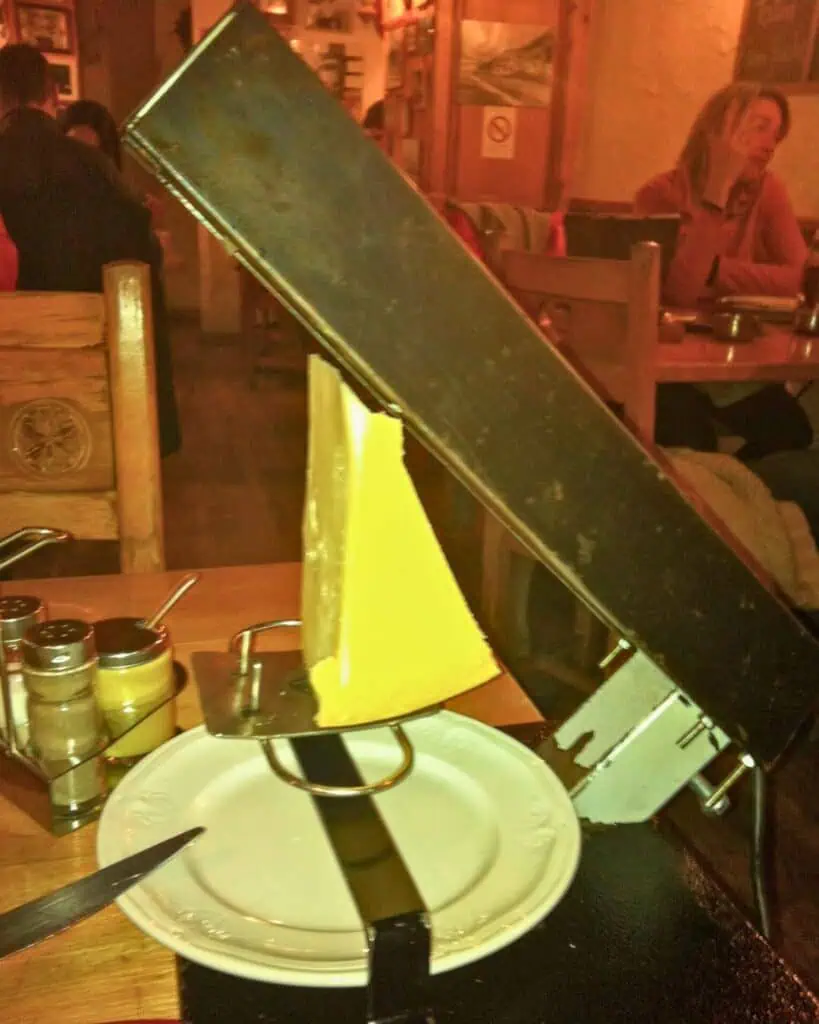 Enjoying Raclette for dinner, my first night in Val D’Isere