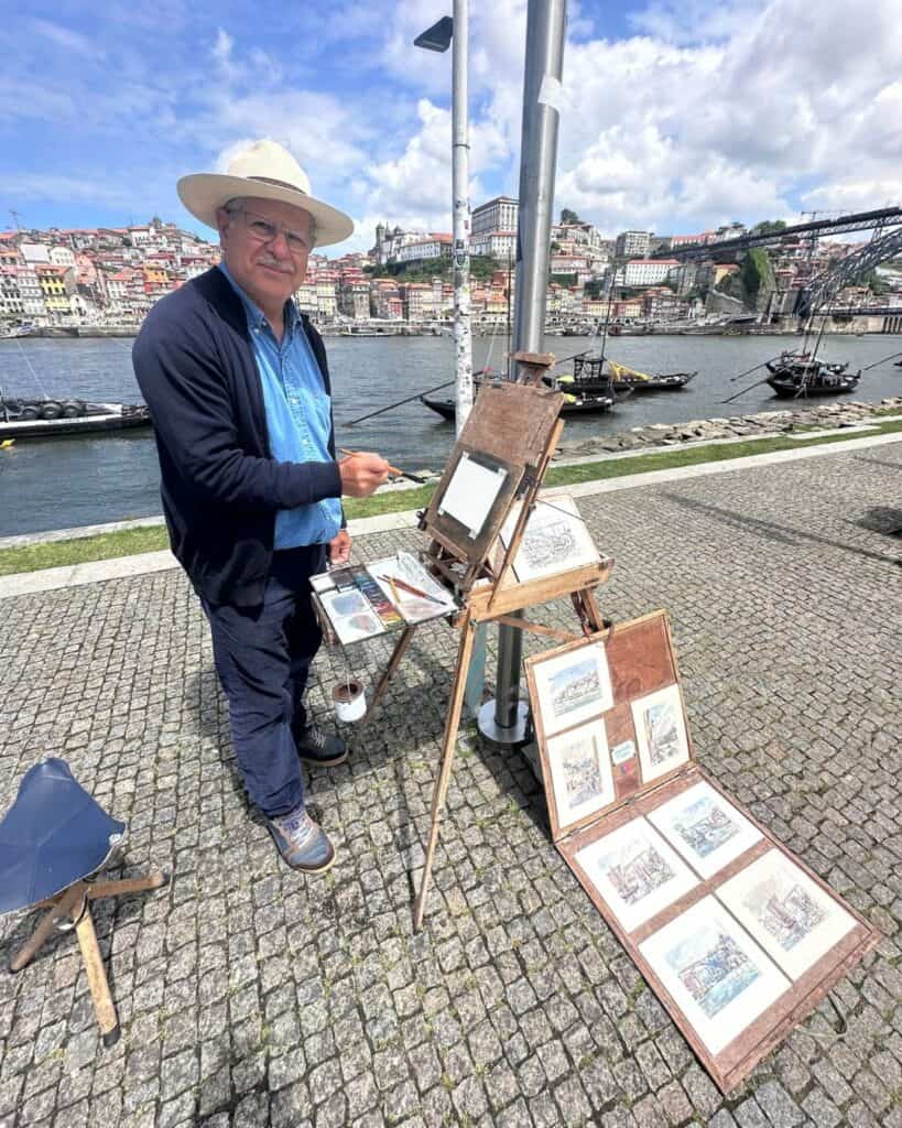 Painter in Vila Nova de Gaia riverfront