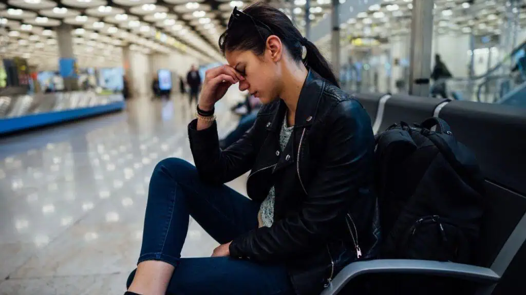 woman frustrated at airport