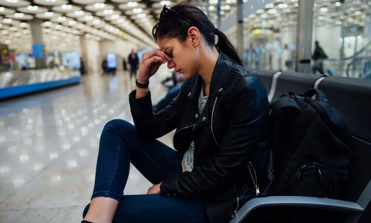 woman frustrated at airport