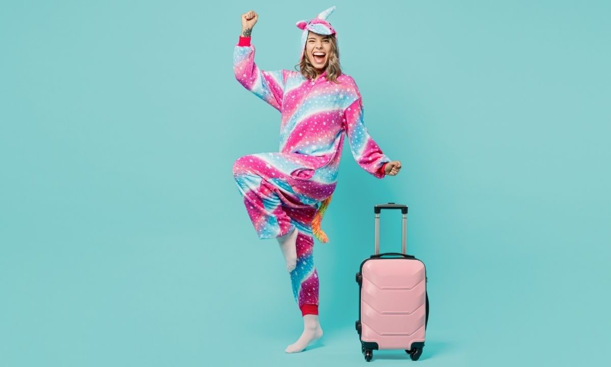 Woman in Costume with Luggage